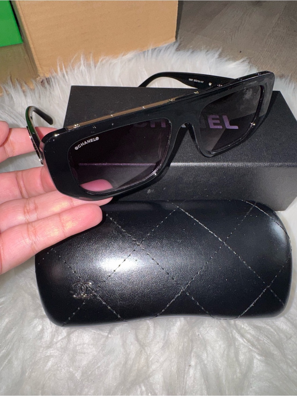 CHANEL Black Sunglasses with Gradient Purple Lenses
